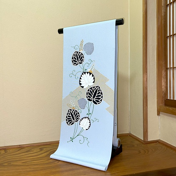 葵に疋田松皮菱(水色地)　九寸名古屋帯